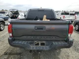 2019 Toyota Tacoma SR5 with VIN 3TMAZ5CN9KM090828, listed as a Copart auction lot 49498715 with 118,551 mi miles and Salvage title. Bid and sale history available at DreamBid. Image 6.