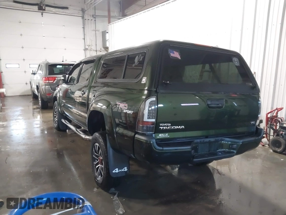2012 Toyota Tacoma with VIN 3TMLU4EN2CM094154, listed as a IAAI auction lot 41322227 with 270,712 mi miles and . Bid and sale history available at DreamBid. Image 3.