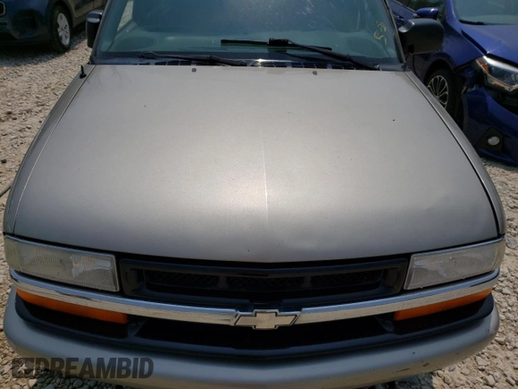 2000 Chevrolet Blazer LS z VIN 1GNCT18W3YK175871, wystawiony jako Copart lot #58230204 z przebiegiem Nie podano mil oraz Nie do naprawy • Non repairable. Historia ofert i sprzedaży dostępna na DreamBid. Obrazek 11.