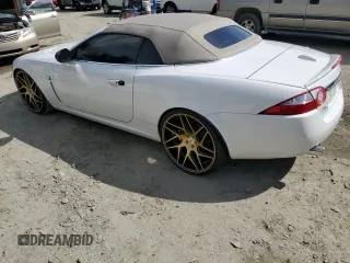 2007 Jaguar XK with VIN SAJDA44B775B05606, listed as a Copart auction lot 49419515 with 115,607 mi miles and Salvage Title. Bid and sale history available at DreamBid. Image 2.