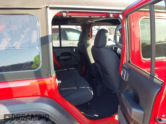 2022 Jeep Wrangler Unlimited Willys with VIN 1C4HJXDN3NW129708, listed as a IAAI auction lot 42025893 with 14,548 mi miles and . Bid and sale history available at DreamBid. Image 8.
