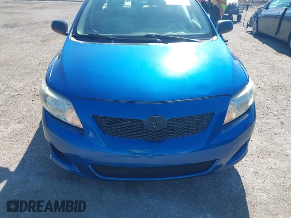 2009 Toyota Corolla with VIN JTDBL40E999021523, listed as a IAAI auction lot 42019856 with 194,011 mi miles. Bid and sale history available at carsss.com. Image 13.
