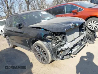 2020 BMW X3 M with VIN 5YMTS0C08L9B20402, listed as a IAAI auction lot 41761865 with 48,454 mi miles. Bid and sale history available at carsss.com. Image 1.
