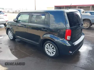 2014 Scion xB with VIN JTLZE4FE4EJ064549, listed as a IAAI auction lot 41392280 with 148,962 mi miles. Bid and sale history available at carsss.com. Image 3.