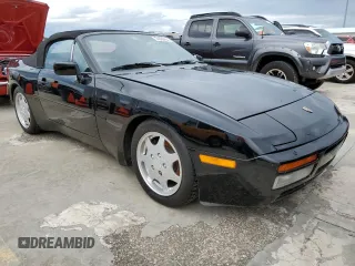 1990 Porsche 944 z VIN WP0CB2946LN480366, wystawiony jako Copart lot #74369454 z przebiegiem 78 709 mil mil oraz Szkoda całkowita • Salvage title. Historia ofert i sprzedaży dostępna na DreamBid. Obrazek 4.