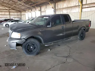 2005 Ford F-150 STX with VIN 1FTRX12W25NA37703, listed as a Copart auction lot 60089325 with 128,651 mi miles and Salvage title. Bid and sale history available at DreamBid. Image 1.