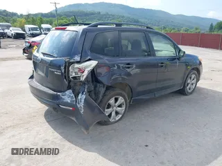 2014 Subaru Forester Premium with VIN JF2SJAECXEH522241, listed as a IAAI auction lot 42667748 with 249,092 mi miles and . Bid and sale history available at DreamBid. Image 4.