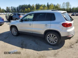 2012 Volkswagen Tiguan SE z VIN WVGAV7AXXCW513800, wystawiony jako Copart lot #53005945 z przebiegiem 155 920 mil mil oraz Tytuł czysty. Historia ofert i sprzedaży dostępna na DreamBid. Obrazek 2.