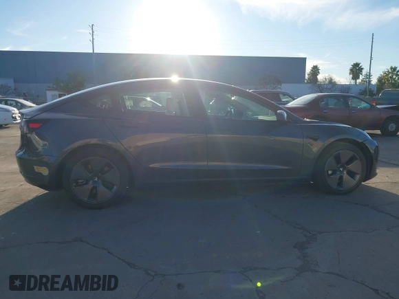 2022 Tesla Model 3 Long Range with VIN 5YJ3E1EB4NF293635, listed as a IAAI auction lot 41388234 with 28,396 mi miles and . Bid and sale history available at DreamBid. Image 14.