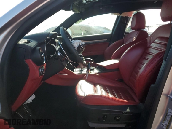 2019 Alfa Romeo Stelvio Ti z VIN ZASPAKBN2K7C40054, wystawiony jako Copart lot #86020774 z przebiegiem 16 135 mil mil oraz Szkody całkowita. Historia ofert i sprzedaży dostępna na DreamBid. Obrazek 7.