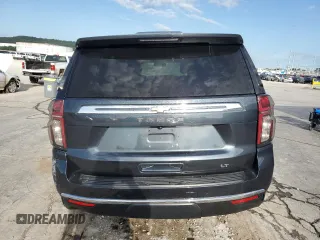 2021 Chevrolet Tahoe LT with VIN 1GNSKNKD2MR243205, listed as a Copart auction lot 61461115 with 109,782 mi miles and Salvage title. Bid and sale history available at DreamBid. Image 6.