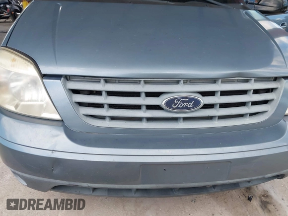 2004 Ford Freestar SES z VIN 2FMZA576X4BA05461, wystawiony jako IAAI lot #42255432 z przebiegiem 115 971 mil mil oraz . Historia ofert i sprzedaży dostępna na DreamBid. Obrazek 6.
