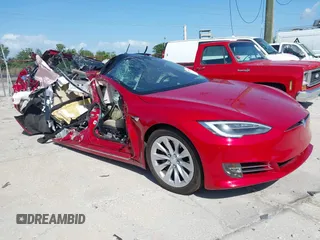2016 Tesla Model S 90D with VIN 5YJSA1E27GF167442, listed as a IAAI auction lot 41989371 with Not Provided miles and . Bid and sale history available at DreamBid. Image 1.