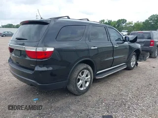 2013 Dodge Durango Crew z VIN 1C4RDJDG4DC680921, wystawiony jako IAAI lot #42160588 z przebiegiem 177 858 mil mil oraz . Historia ofert i sprzedaży dostępna na DreamBid. Obrazek 4.