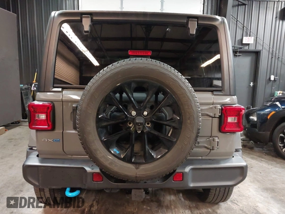 2022 Jeep Wrangler Unlimited Sahara with VIN 1C4JJXP66NW198723, listed as a IAAI auction lot 41368728 with 31,814 mi miles and . Bid and sale history available at DreamBid. Image 16.