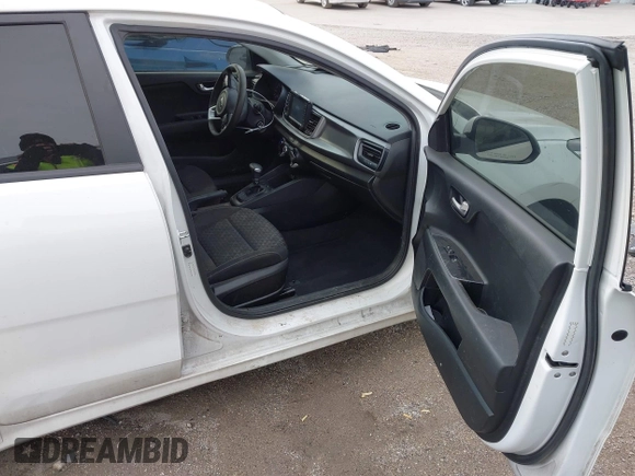 2019 Kia Rio S with VIN 3KPA24ABXKE215756, listed as a IAAI auction lot 41556461 with 122,300 mi miles. Bid and sale history available at carsss.com. Image 5.