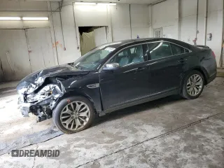 2014 Ford Taurus Limited with VIN 1FAHP2F84EG103983, listed as a Copart auction lot 60139305 with 102,775 mi miles and Salvage title. Bid and sale history available at DreamBid. Image 1.
