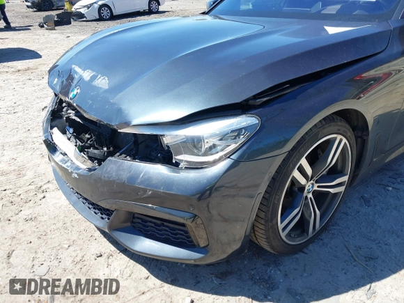 2016 BMW 7 Series 740i with VIN WBA7E2C54GG714649, listed as a IAAI auction lot 41815220 with 89,029 mi miles. Bid and sale history available at carsss.com. Image 6.