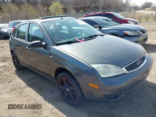 2007 Ford Focus S z VIN 1FAHP37N17W316344, wystawiony jako IAAI lot #41882805 z przebiegiem 262 422 mil mil oraz . Historia ofert i sprzedaży dostępna na DreamBid. Obrazek 1.