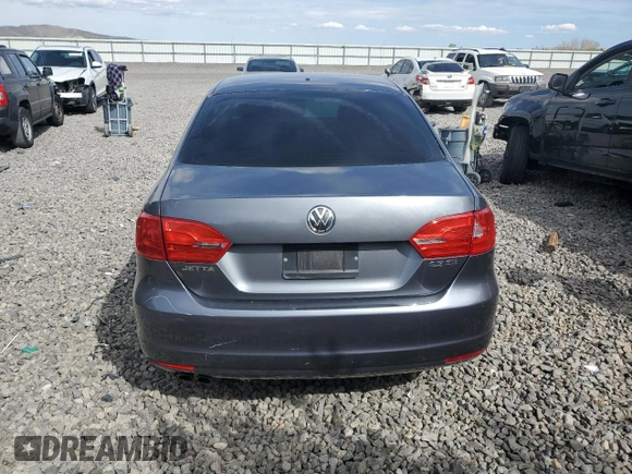 2012 Volkswagen Jetta SE with VIN 3VWDP7AJ2CM311442, listed as a Copart auction lot 55118825 with 124,478 mi miles and Salvage title. Bid and sale history available at DreamBid. Image 6.