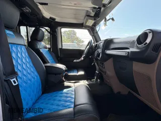 2012 Jeep Wrangler Unlimited Altitude z VIN 1C4HJWEG5CL222948, wystawiony jako Copart lot #61101825 z przebiegiem 106 991 mil mil oraz Czysty tytuł • Clean title. Historia ofert i sprzedaży dostępna na DreamBid. Obrazek 5.