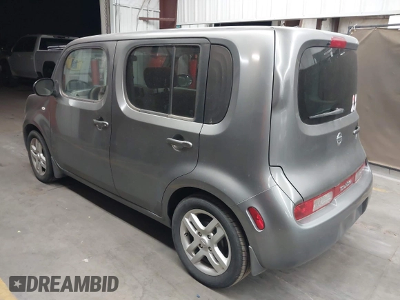 2011 Nissan Cube 1.8 SL with VIN JN8AZ2KR2BT212311, listed as a IAAI auction lot 42002493 with 128,372 mi miles. Bid and sale history available at carsss.com. Image 3.