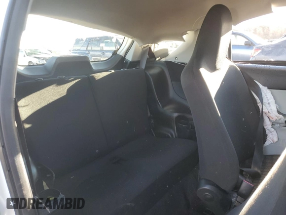 2014 Scion iQ with VIN JTNJJXB01EJ026837, listed as a Copart auction lot 43596385 with 52,826 mi miles and Salvage title. Bid and sale history available at DreamBid. Image 10.