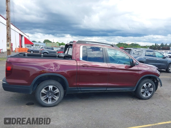 2019 Honda Ridgeline RTL z VIN 5FPYK3F50KB043492, wystawiony jako IAAI lot #42265068 z przebiegiem 86 768 mil mil oraz . Historia ofert i sprzedaży dostępna na DreamBid. Obrazek 14.