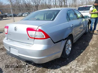 2009 Mercury Milan with VIN 3MEHM07Z89R614284, listed as a IAAI auction lot 41784771 with 154,751 mi miles. Bid and sale history available at carsss.com. Image 4.