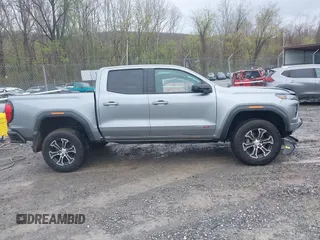 2024 GMC Canyon 4WD AT4 with VIN 1GTP6DEKXR1143138, listed as a IAAI auction lot 41952154 with 26,062 mi miles. Bid and sale history available at carsss.com. Image 13.