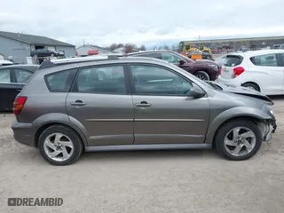 2007 Pontiac Vibe with VIN 5Y2SL65837Z414154, listed as a IAAI auction lot 42033597 with 121,728 mi miles. Bid and sale history available at carsss.com. Image 13.