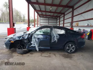 2019 Honda Civic Sedan LX with VIN 19XFC2F6XKE201052, listed as a IAAI auction lot 41961558 with 94,149 mi miles. Bid and sale history available at carsss.com. Image 15.