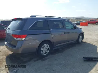 2015 Honda Odyssey LX with VIN 5FNRL5H29FB032327, listed as a IAAI auction lot 42052043 with 153,365 mi miles and . Bid and sale history available at DreamBid. Image 4.