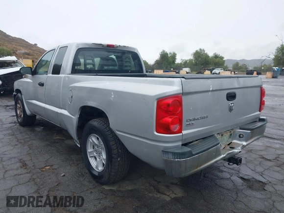 2005 Dodge Dakota SLT with VIN 1D7HE42K05S231198, listed as a IAAI auction lot 41552349 with 149,915 mi miles and . Bid and sale history available at carsss.com. Image 3.