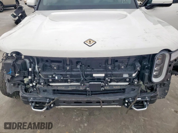 2022 Rivian R1T Adventure z VIN 7FCTGAAA8NN013508, wystawiony jako Copart lot #50834485 z przebiegiem Nie podano mil oraz Szkody całkowita. Historia ofert i sprzedaży dostępna na DreamBid. Obrazek 11.