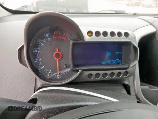 2012 Chevrolet Sonic LT z VIN 1G1JC5SH2C4208687, wystawiony jako Copart lot #57450375 z przebiegiem 155 645 mil mil oraz Szkoda całkowita • Salvage title. Historia ofert i sprzedaży dostępna na DreamBid. Obrazek 9.