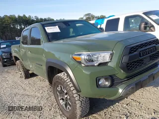 2021 Toyota Tacoma SR z VIN 5TFCZ5AN8MX271069, wystawiony jako IAAI lot #41903373 z przebiegiem 113 810 mil mil oraz . Historia ofert i sprzedaży dostępna na DreamBid. Obrazek 1.
