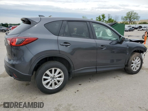 2014 Mazda CX-5 Touring z VIN JM3KE4CY2E0368729, wystawiony jako Copart lot #55563645 z przebiegiem 204 521 mil mil oraz Szkoda całkowita • Salvage title. Historia ofert i sprzedaży dostępna na DreamBid. Obrazek 3.