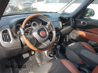 2014 FIAT 500L Trekking with VIN ZFBCFADH2EZ023383, listed as a IAAI auction lot 40838506 with 60,489 mi miles and . Bid and sale history available at DreamBid. Image 5.