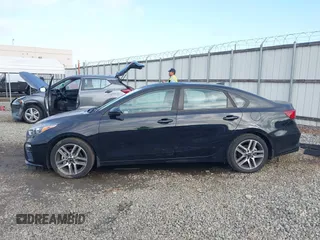 2019 Kia Forte S z VIN 3KPF34AD0KE110678, wystawiony jako IAAI lot #42148966 z przebiegiem 36 618 mil mil oraz . Historia ofert i sprzedaży dostępna na DreamBid. Obrazek 14.