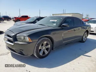 2013 Dodge Charger SE z VIN 2C3CDXBG2DH631889, wystawiony jako Copart lot #52735265 z przebiegiem 105 950 mil mil oraz Szkoda całkowita • Salvage title. Historia ofert i sprzedaży dostępna na DreamBid. Obrazek 1.