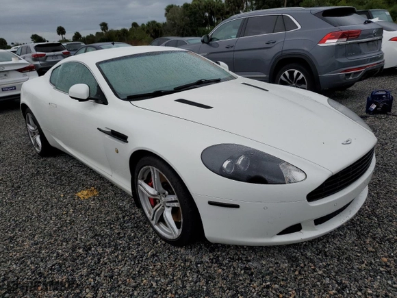 2011 Aston Martin DB9 with VIN SCFFDAAE8BGA13186, listed as a Copart auction lot 74703544 with 0 mi miles and Salvage Title. Bid and sale history available at carsss.com. Image 4.