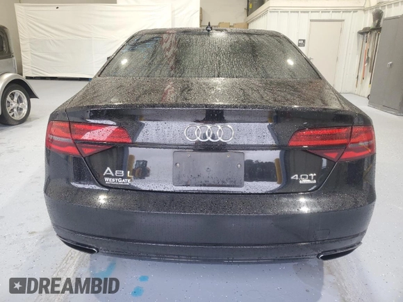 2017 Audi A8 Sport z VIN WAU43AFD4HN020515, wystawiony jako Copart lot #44953055 z przebiegiem 115 422 mil mil oraz Szkody całkowita. Historia ofert i sprzedaży dostępna na DreamBid. Obrazek 6.