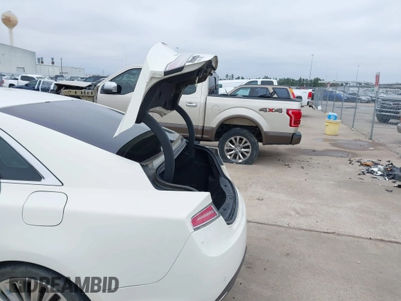 2013 Lincoln MKZ с VIN 3LN6L2GK1DR802742, выставлен на аукционе IAAI как лот 41620598 с пробегом 134 353 миль миль и . История ставок и продаж доступна на DreamBid. Изображение 18.