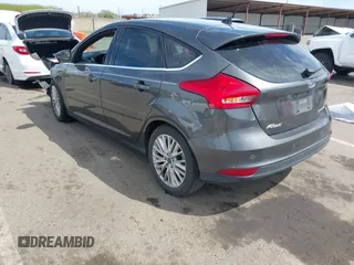 2018 Ford Focus Titanium with VIN 1FADP3N23JL241453, listed as a IAAI auction lot 42025190 with 90,174 mi miles and . Bid and sale history available at DreamBid. Image 3.
