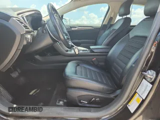 2017 Ford Fusion Hybrid SE with VIN 3FA6P0LU9HR356534, listed as a Copart auction lot 63660315 with 121,195 mi miles and Clean title. Bid and sale history available at DreamBid. Image 7.