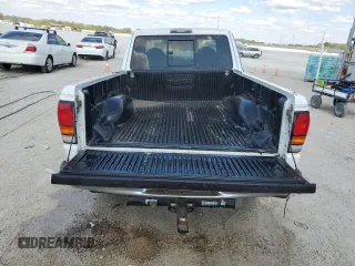 2000 Mazda B-Series 2WD Truck DS with VIN 4F4YR16VXYTM31299, listed as a Copart auction lot 44144695 with 123,283 mi miles and Salvage Title. Bid and sale history available at carsss.com. Image 6.