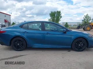 2025 Toyota Camry LE z VIN 4T1DAACK4SU518573, wystawiony jako IAAI lot #42368770 z przebiegiem 30 727 mil mil oraz . Historia ofert i sprzedaży dostępna na DreamBid. Obrazek 13.