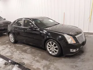 2009 Cadillac CTS AWD w/1SB with VIN 1G6DT57V490106183, listed as a IAAI auction lot 41593354 with 71,332 mi miles. Bid and sale history available at carsss.com. Image 1.