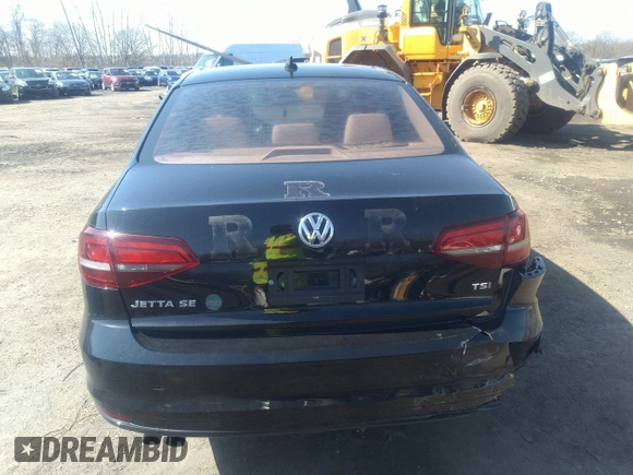 2016 Volkswagen Jetta Sedan 1.4T SE with VIN 3VWD67AJXGM242539, listed as a IAAI auction lot 38948493 with 121,876 mi miles. Bid and sale history available at carsss.com. Image 16.